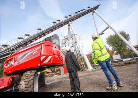 Cleebronn, Germany. 22nd Nov, 2019. Employees are standing on the construction site of the Tripsdrill amusement park. At a press conference, the amusement park shows first impressions of the construction of two new roller coasters, which will have the names 'neck over head' and 'full steam'. Credit: Christoph Schmidt/dpa/Alamy Live News Stock Photo