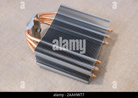Personal computer new part heating radiator cooler thermostat made from aluminum metal. Stock Photo