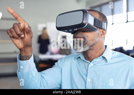 Business professional at work using VR Stock Photo
