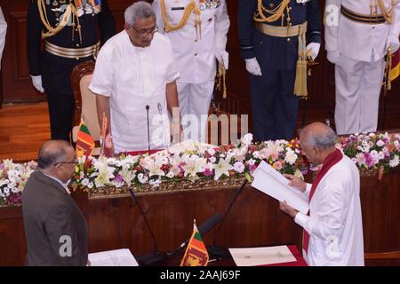 (191122) -- COLOMBO, Nov. 22, 2019 (Xinhua) -- Dinesh Gunawardena is sworn in as the country's minister of Foreign Affairs, Skills Development, Employment and Labor Relations at the Presidential Secretariat in Colombo, Sri Lanka, Nov. 22, 2019. Sri Lankan President Gotabaya Rajapaksa on Friday appointed a new 16 member cabinet which will function till the next parliamentary election is announced. The new ministers took oaths in front of the president at the Presidential Secretariat in capital Colombo. (Photo by Gayan Sameer/Xinhua) Stock Photo