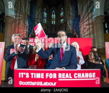Glasgow, UK. 22 November 2019. Pictured: (left) Richard Leonard MSP - Leader of the Scottish Labour Party, (centre) Paul Sweeney MP - Member of the Labour Party for Glasgow North East Constituency. Richard Leonard is joined in the Gorbals by Faten Hameed and other Scottish Labour PCCs to launch Scottish Labour’s manifesto. Credit: Colin Fisher/Alamy Live News Stock Photo
