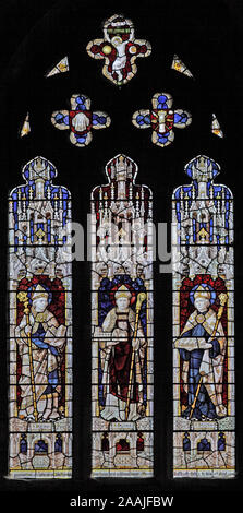 A stained glass window by Burlison & Grylls depicting Saints Dyfrig, Deiniol and Beuno, Bangor Cathedral, Bangor, Gwynedd, Wales Stock Photo