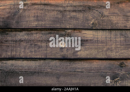 Shabby wooden desk surface. Natural color. Brown wood striped texture. Weathered planks, background. Antique fence, oak boards. Plank - timber. Stock Photo