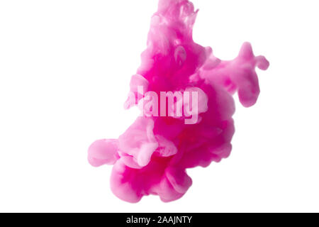 Abstract flowing liquid or pink ink in water on a white background. zero gravity. Stock Photo