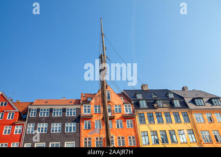 view of Architecture and boat masts of Nyhavn in Copenhagen Stock Photo