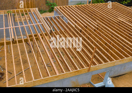 House framing floor construction showing massive solid wood joists trusses Stock Photo