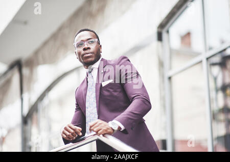 A beautiful young African American who thinks about a serious idea. Confident in making business decisions. Stock Photo