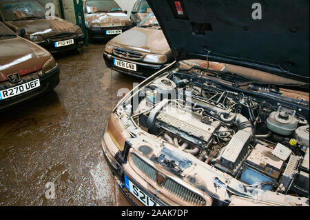 Insurance claim. Cars that were totally submerged and written off by the January 2005 floods in Carlisle, after the River Eden burst its banks, Cumbri Stock Photo