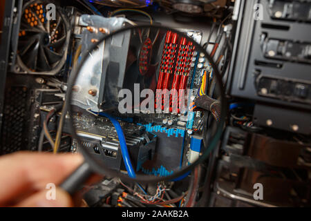 Computer repair concept. Diagnostics of components of an old computer. Stock Photo