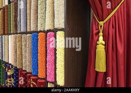 Colorful carpet samples in the store Stock Photo