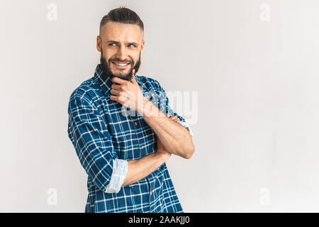 Adult bearded man with ponder and smiling face Stock Photo