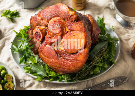 Homemade Glazed Holiday Ham Roast with All the Sides Stock Photo
