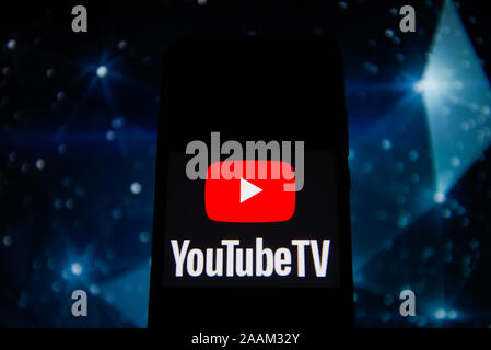 In this photo illustration a Youtube TV logo seen displayed on a smartphone. Stock Photo