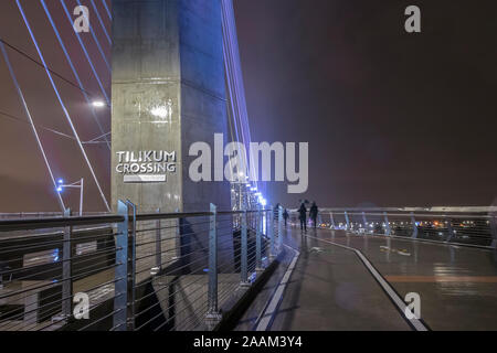 Tilikum Crossing at night in the rain with lights Stock Photo