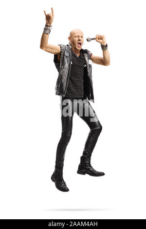Bald punk rocker singing on a microphone and playing a guitar isolated ...
