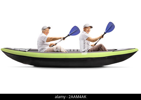Elderly couple paddling in a kayak isolated on white background Stock Photo
