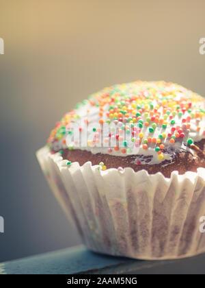 Little easter cupcake wrapped in white paper Stock Photo