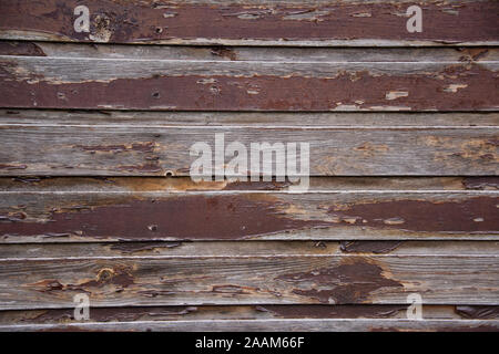 generic background of wooden half painted planks horizontal worn out brown paint Stock Photo