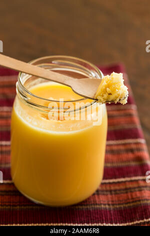 Homemade Ghee/clarified butter in a glass jar Stock Photo