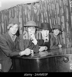 2nd February 1967. The English Pop group The Small Faces collecting an award. Members include Steve Marriott, Ronnie Lane, Kenney Jones, and Ian McLagan. Stock Photo