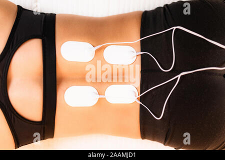 TENS (transcutaneous electrical nerve stimulation) knee physical therapy  Stock Photo - Alamy