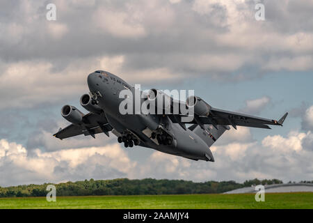 NEW WINDSOR, NY - SEPTEMBER 15, 2018: Giant C-17 Globemaster III taking off at Stewart International Airport during the New York Airshow. Stock Photo