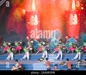 Chongqing, China's Chongqing Municipality. 22nd Nov, 2019. Artists perform at the opening ceremony of the 13th China Chongqing Yangtze River Three Gorges (Wushan) International Red Leaf Festival in Wushan County, southwest China's Chongqing Municipality, Nov. 22, 2019. The red leaf festival kicked off here Friday, and will last until Dec. 30. Credit: Wang Quanchao/Xinhua/Alamy Live News Stock Photo