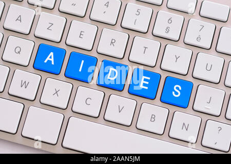 keyboard help blue Stock Photo - Alamy