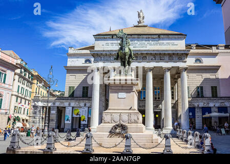 GENOA - JUNE 30: Statue of Giuseppe Garibaldi - italian general and politician on pedestal in front of opera house Stock Photo