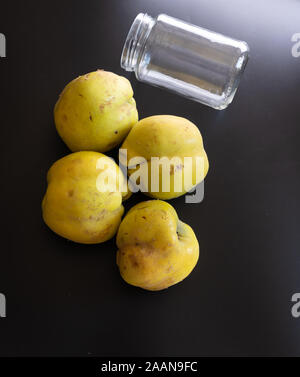 Ingredients for making apple quince jam on black backround Stock Photo