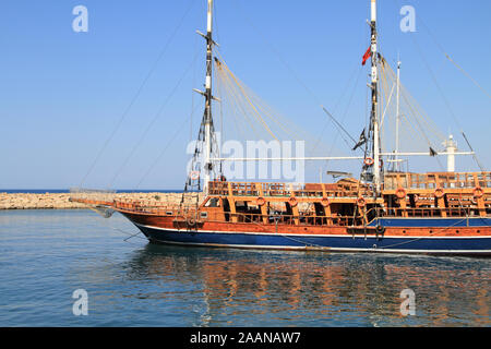 a sailing ship with tourists in the harbor Stock Photo