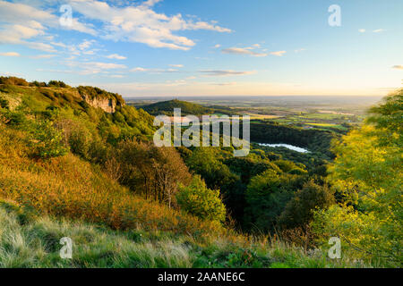 Beautiful scenic long-distance view (Lake Gormire, Hood Hill, Whitestone Cliff, countryside & blue sky) - Sutton Bank, North Yorkshire, England, UK.
