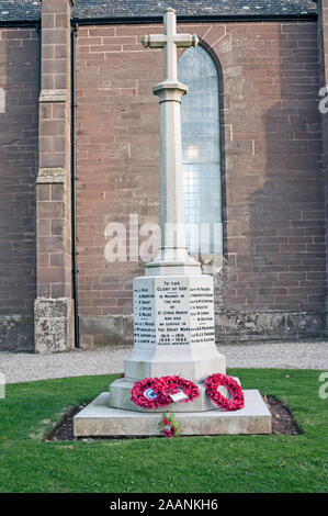 Wreaths and poppies on War Memorial at Mearns Coastal Parish, Church of Scotland, St. Cyrus Church, St. Cyrus, Aberdeenshire, Scotland, UK. Stock Photo
