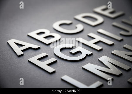 Alphabet detail made with solid letters on a blackboard Stock Photo