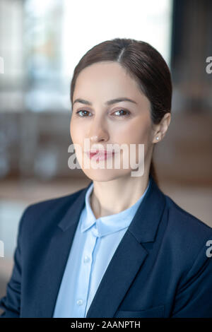 Appealing young successful businesswoman feeling excited and motivated Stock Photo