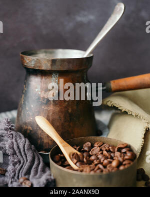 A Turkish coffee pot and beans. Stock Photo