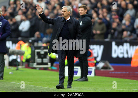 London, UK. 23rd Nov, 2019. Tottenham Hotspur Manager Jose Mourinho instructs his players from the touch line. Premier League match, West Ham United v Tottenham Hotspur at the London Stadium, Queen Elizabeth Olympic Park in London on Saturday 23rd November 2019. this image may only be used for Editorial purposes. Editorial use only, license required for commercial use. No use in betting, games or a single club/league/player publications . Credit: Andrew Orchard sports photography/Alamy Live News Stock Photo