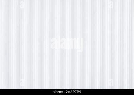 Background, texture made of striped white paper. Vertical lines. Stock Photo