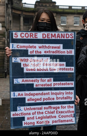 Edinburgh, Scotland, UK. 23rd November 2019.  Rally and march in support of Pro-Democracy movement in Hong Kong organised by the Democracy for Hong Kong in Scotland group started at St Giles Cathedral and proceeded along the Royal Mile to the Scottish Parliament. They attempted to hand over a letter asking for the Scottish Government to support the Pro-Democracy movement in Hong Kong but no MSP (Member of Scottish Parliament ) made themselves available to receive it. Iain Masterton/Alamy Live News. Stock Photo