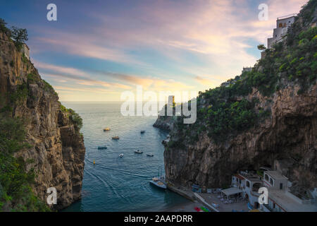 Furore beach bay in Amalfi coast at sunset, panoramic view. Italy, Europe Stock Photo