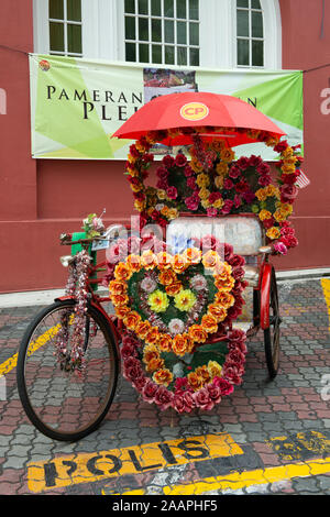 A decorated trishaw in Malacca, Malaysia Stock Photo