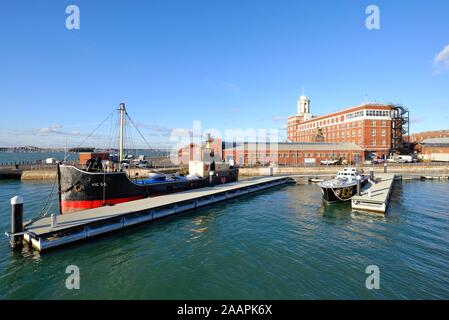 The VIC 56 steamer and the RAF launch 102 moored at the historic dockyard at Portsmouth harbour, Hampshire England UK Stock Photo