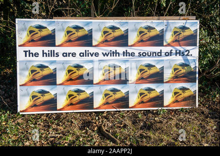 The hills are alive with the sound of HS2 opposition sign near Wendover in Buckinghamshire, UK. 1st February, 2012. A number of High Speed Railway HS2 opposition signs have been placed in fields and on buildings in the county of Buckinghamshire. Many local residents are opposed to the planned HS2 High Speed Rail link from London to Birmingham as it is expected to result in the destruction of countryside, rural habitats and ancient woodlands. Credit: Maureen McLean/Alamy Stock Photo