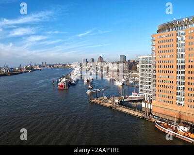 City walk through Hamburg in Germany at Elbe river-here aerial view from the famous music hall Elbphilharmonie Stock Photo