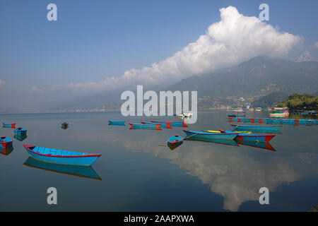 blue row boats floating on lake phew Stock Photo