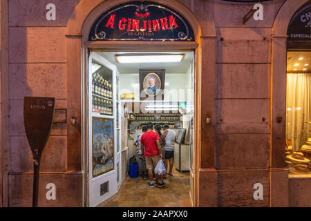 Customers Waiting in Line at Ginjinha , Lisbon, Portugal Stock Photo