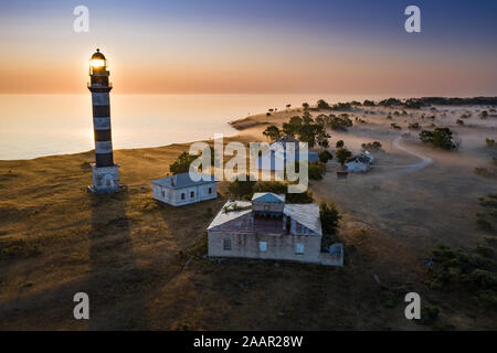 Lighthouse and hause on the small island in the Baltic Sea. Architecture on the Osmussaar, Estonia, Europe. Stock Photo