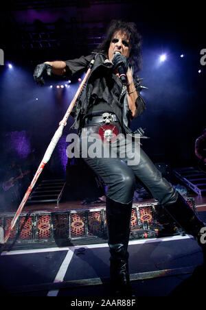 Alice Cooper performing live on stage with a hospital crutch in Bristol, UK at halloween. Stock Photo