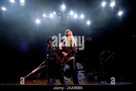 Orianthi performing with Alice Cooper at Colston Hall in Bristol on Halloween. Stock Photo