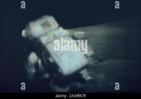 Teleclip - Buzz Aldrin stumbles on Moon surface - Apollo 11 photo taken during live broadcast/s circa 1969-72
